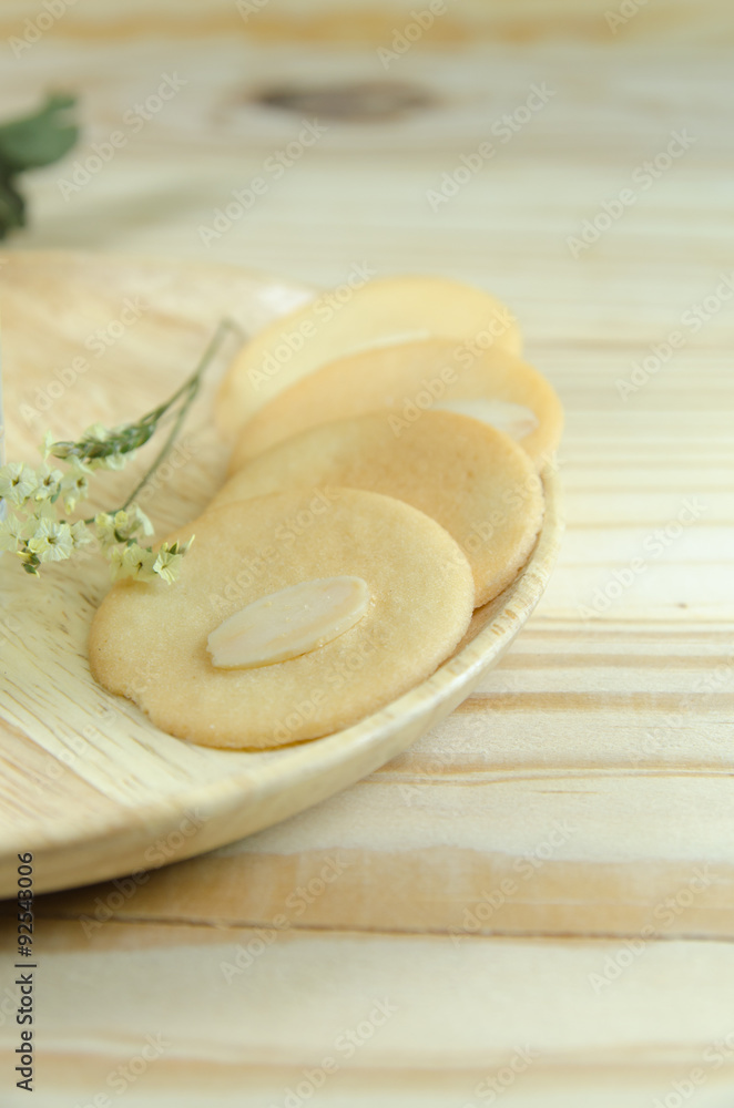 almond cookie on wooden table almond cookie on wooden table