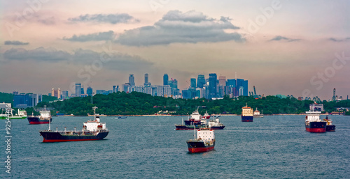 Canvas Print Cargo ships waiting in Singapore Harbour
