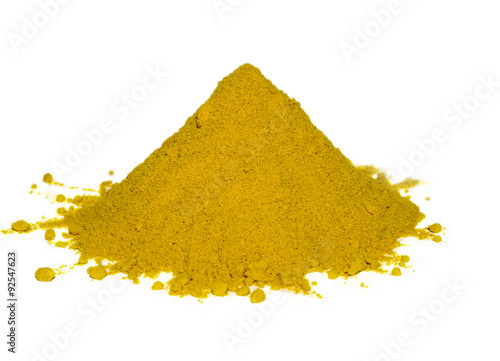 Yellow spice isolated on white background
