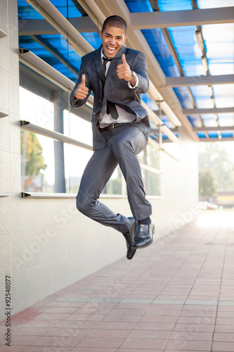 businessman jumping  happy about the successful conclusion of a