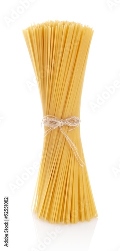 Long pasta spaghetti raw isolated on white