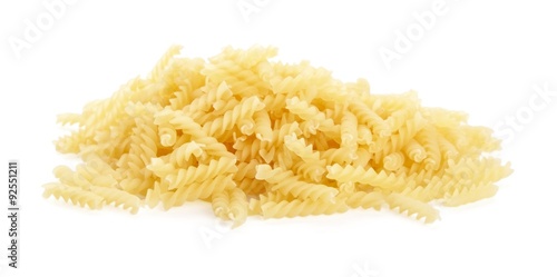 Many fusilli pasta isolated on white