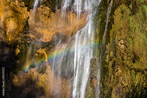Waterfall with rainbow in national park Plitvice, Croatia