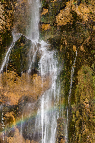 Waterfall with rainbow in national park Plitvice  Croatia