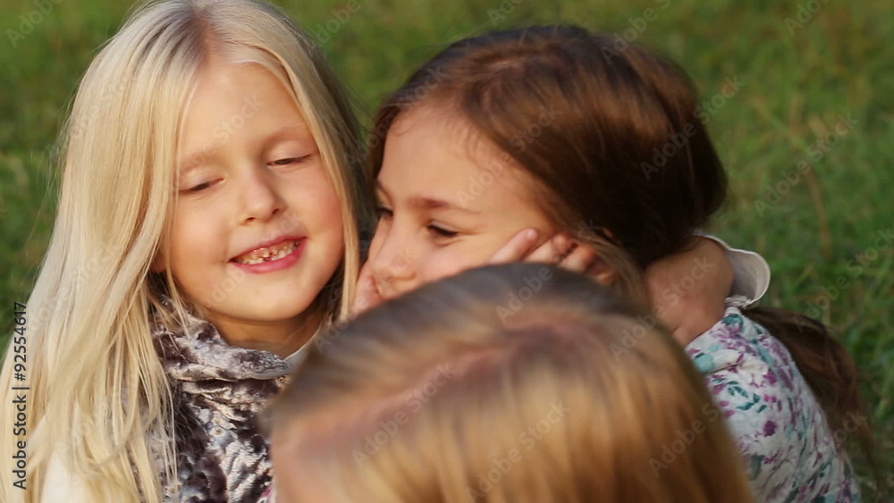 Three girls having fun in the park- handheld shot Three girls having fun in the park- handheld shot