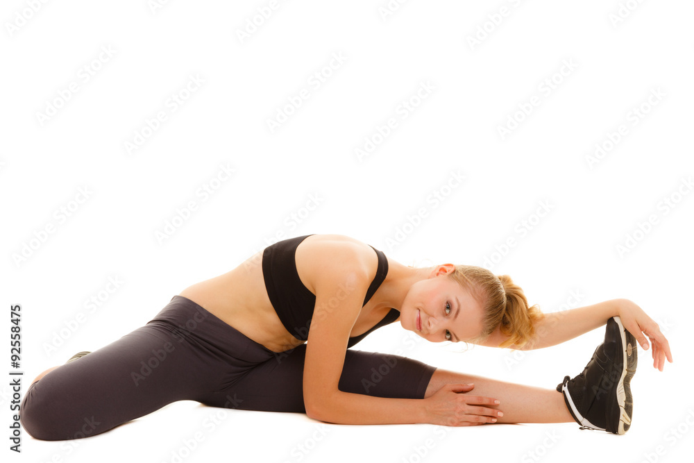 woman in sportswear doing stretching exercise woman in sportswear doing stretching exercise