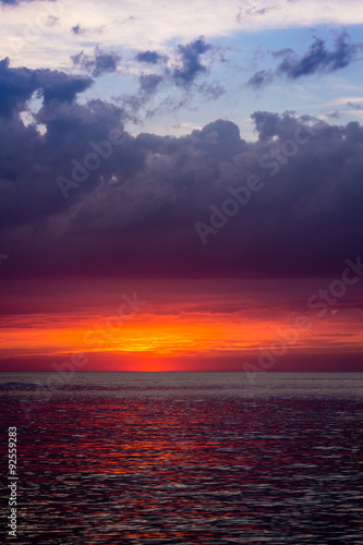 beautiful landscape with sunset over sea with dramatic sky