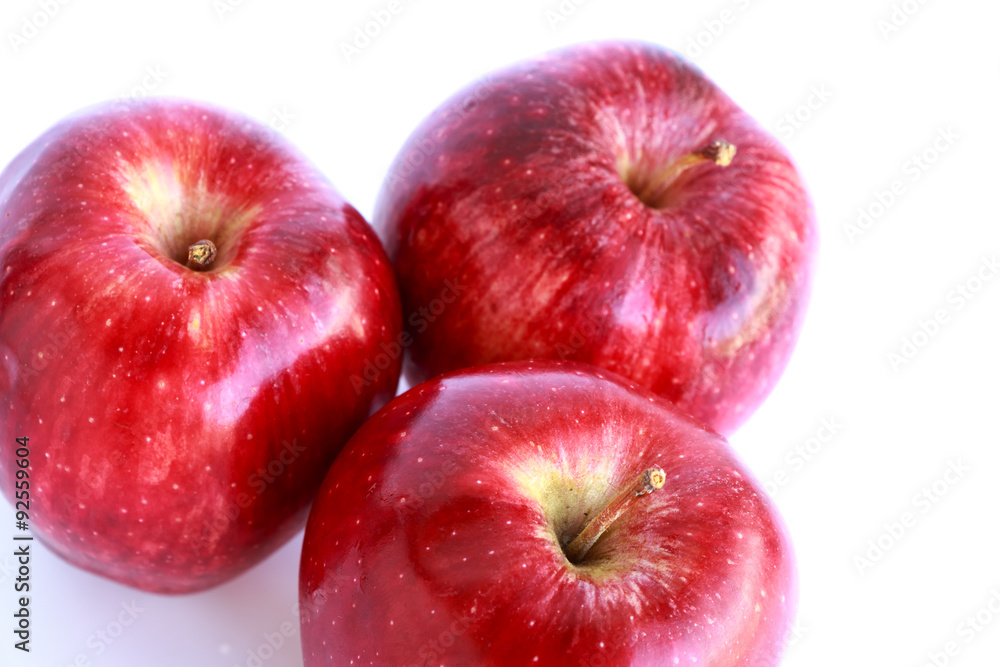 Fresh three red apples isolated on white background. Fresh three red apples isolated on white background.