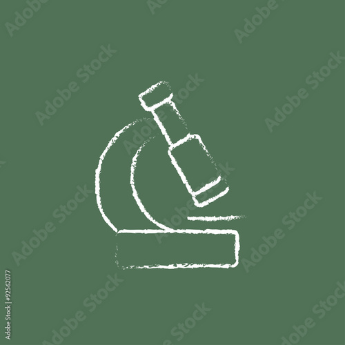 Microscope icon drawn in chalk.