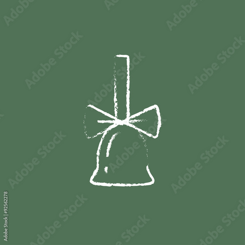 School bell with ribbon icon drawn in chalk.