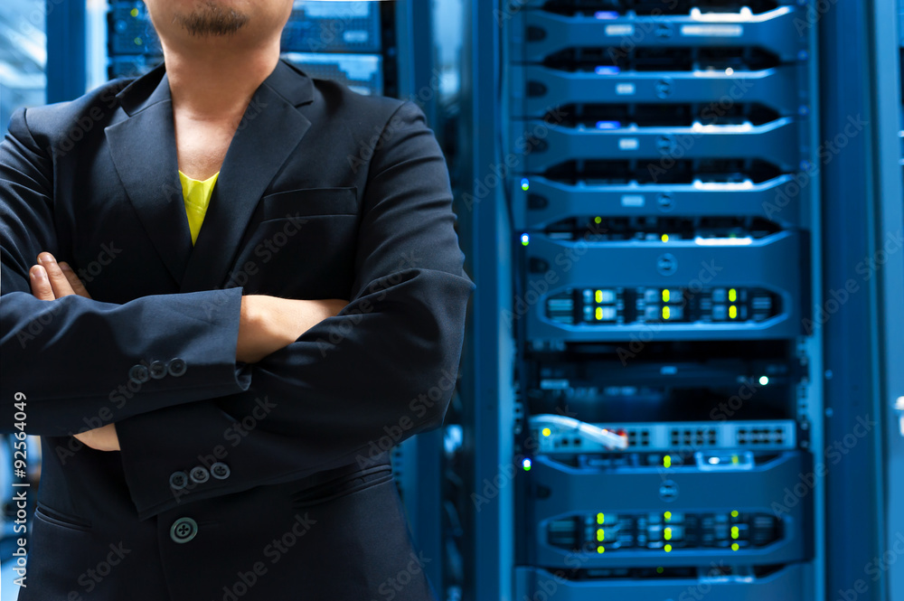 Fototapeta premium Man fix server network in data center room