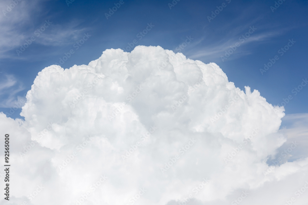Close-up big fluffy clouds in light blue sky, beautiful cloudsca Close-up big fluffy clouds in light blue sky, beautiful cloudsca