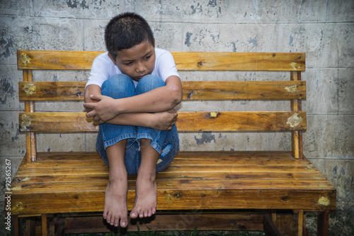Wallpaper Mural Young homeless Asian boy scared and alone, he is at high risk of being abused and trafficked Torontodigital.ca