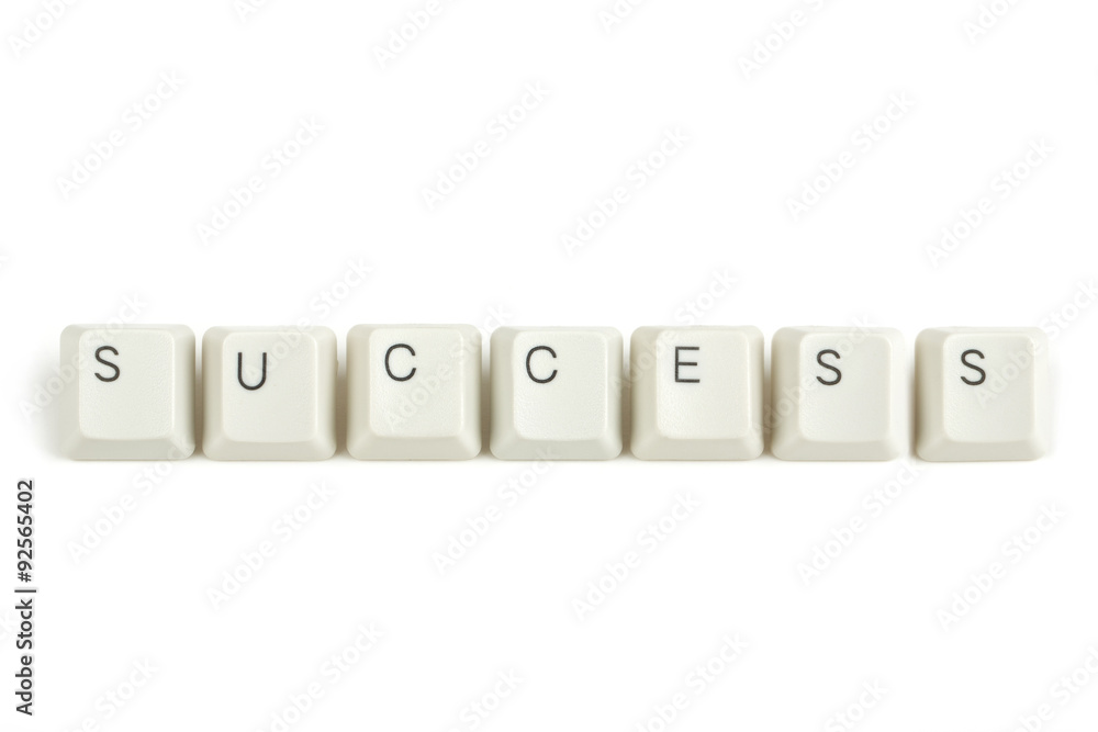 success from scattered keyboard keys on white success from scattered keyboard keys on white