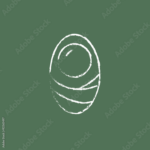 Infant wrapped in swaddling clothes icon drawn chalk.