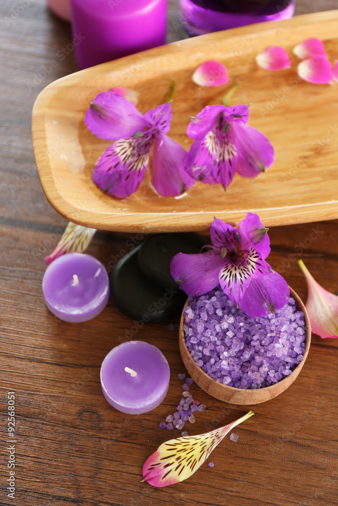Beautiful composition of spa treatment on wooden table Beautiful composition of spa treatment on wooden table