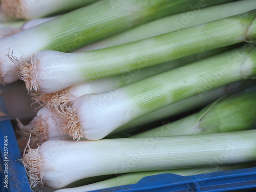 Pile of fresh leeks at farmers market
