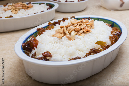 Rice with raisins and peanuts, decorative bowl