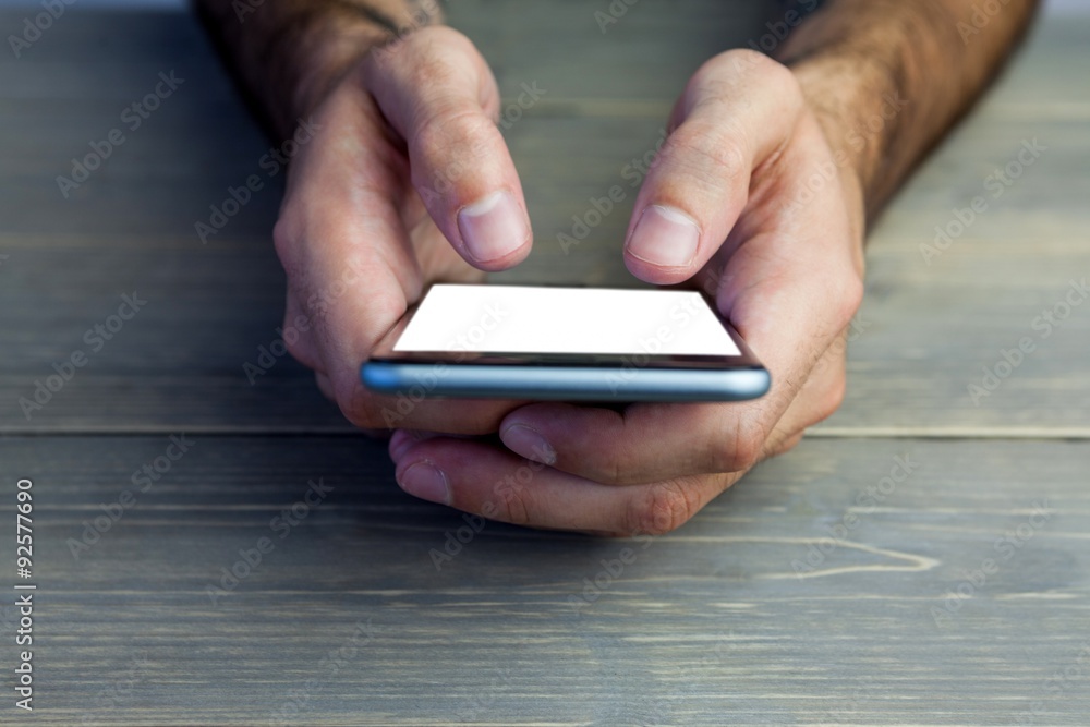 Cropped image of person holding mobile phone Cropped image of person holding mobile phone