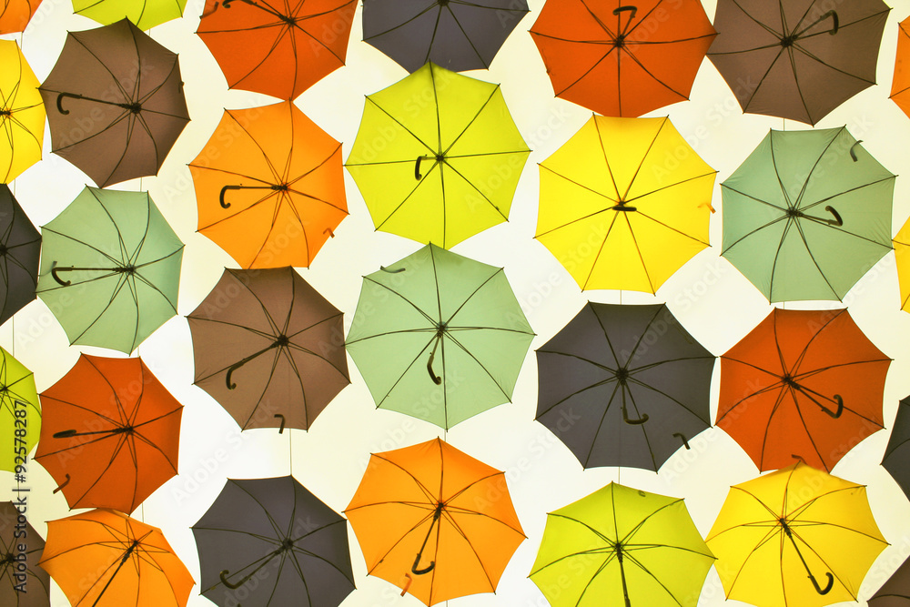 Many open up in the sky umbrellas Many open up in the sky umbrellas