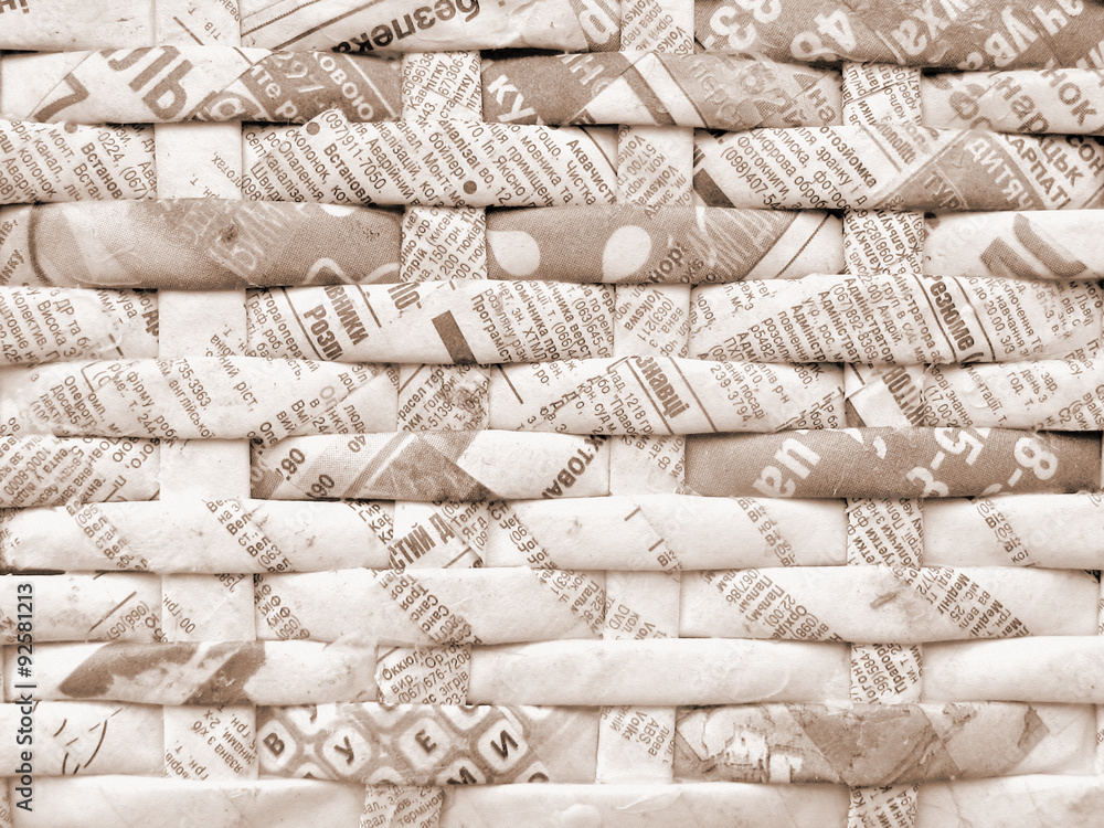 Twisted weaving newspapers. Abstract textured background. Cyrillic letters. Twisted weaving newspapers. Abstract textured background. Cyrillic letters.