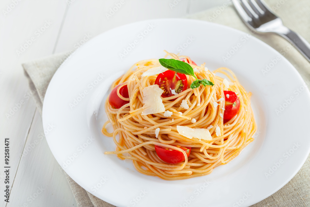 Pasta with tomato sauce, parmesan cheese and basil, Italian food