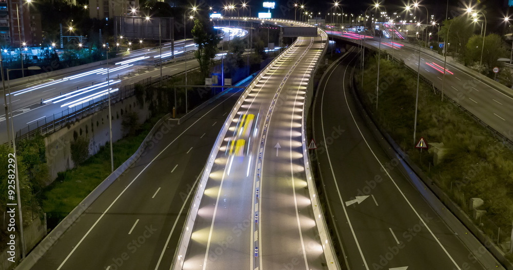 Night scene time lapse traffic and roads top view, of entry and exit of Barcelona.Time Lapse - Long exposure - 4K. Smooth motion camera: TILT - ZOOM. (12) Night scene time lapse traffic and roads top view, of entry and exit of Barcelona.Time Lapse - Long exposure - 4K. Smooth motion camera: TILT - ZOOM. (12)