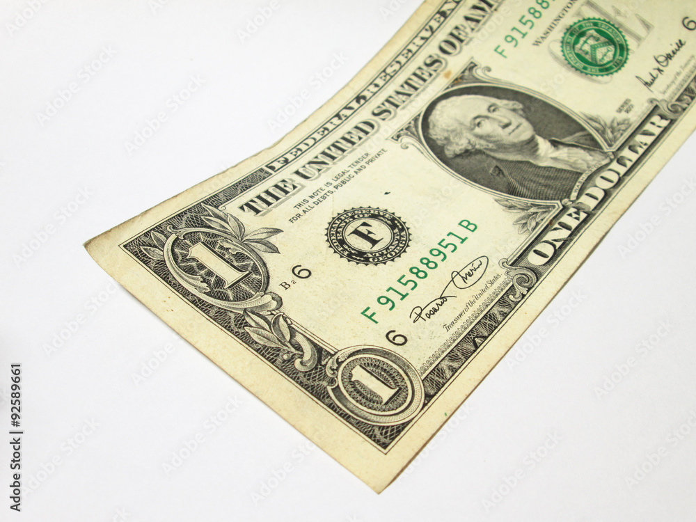 Isolated one dollar banknotes on a white background, featuring a portrait of President George Washington Isolated one dollar banknotes on a white background, featuring a portrait of President George Washington