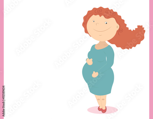 A pregnant woman in the third trimester hugging her belly and smiling