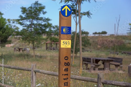 Pole telling the distance to Santiago on the Camino photo