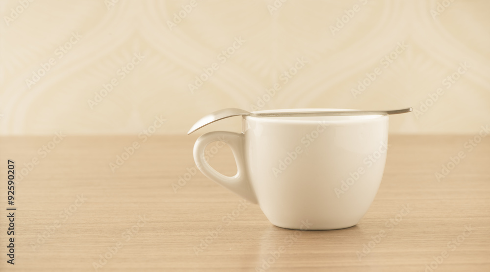 Empty coffee cup on wooden table