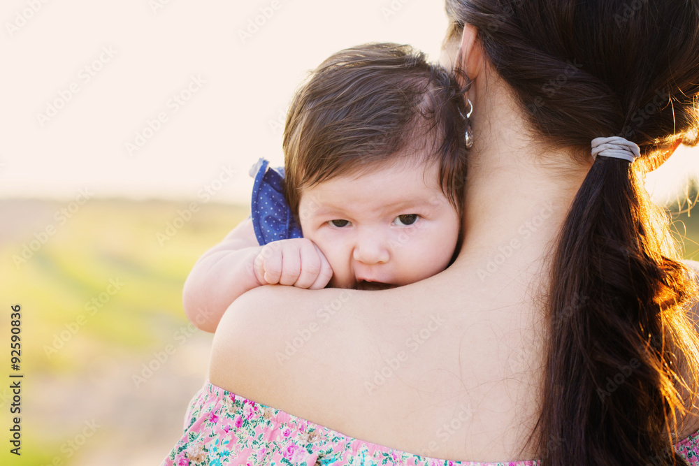 Fototapeta premium baby with mother outdoor