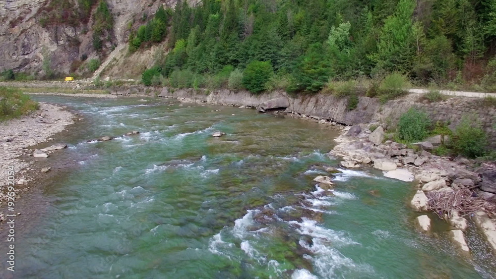 Aerial: flight over river rapids