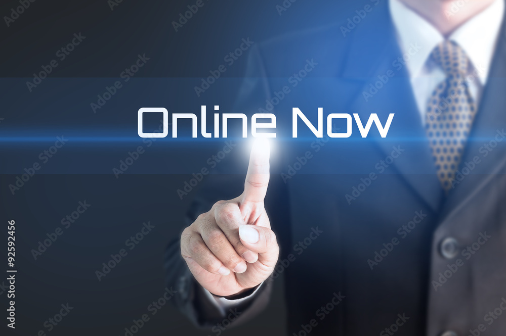 A Businessman holding a white sign with the message online now. Can bring to the medium of your ad. A Businessman holding a white sign with the message online now. Can bring to the medium of your ad.