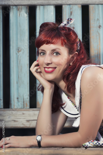 pinup young woman in vintage style clothing