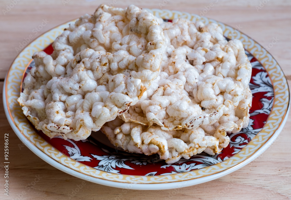 Rice chips cracker on plate Rice chips cracker on plate
