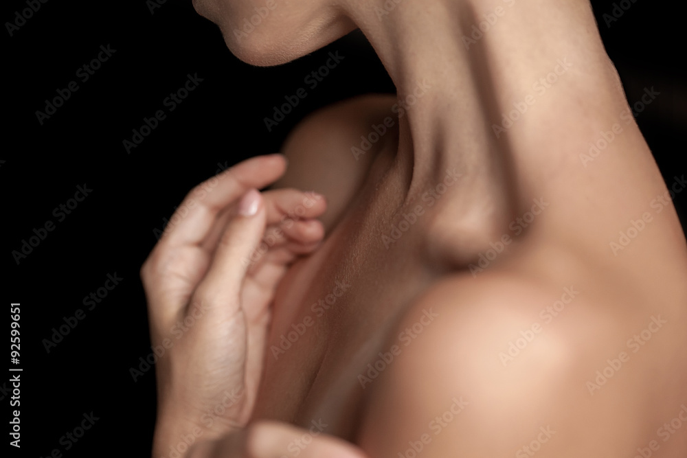 The close-up of a young woman's neck