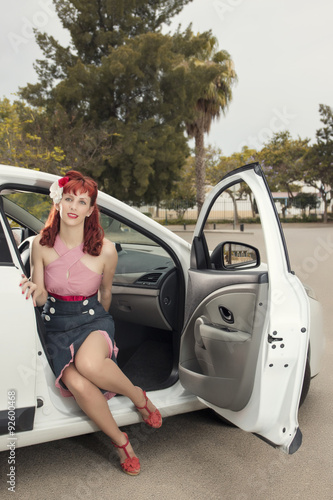 pinup young woman in vintage style clothing