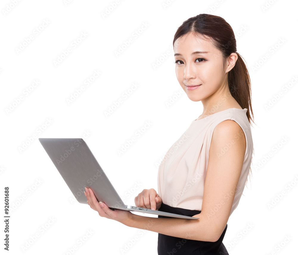 Young Businesswoman use of notebook computer Young Businesswoman use of notebook computer
