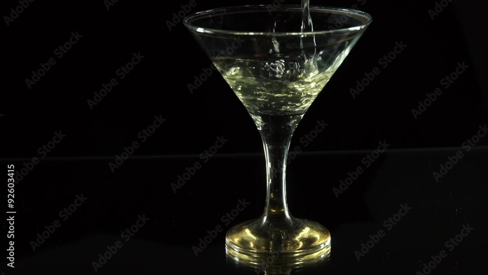 Pouring Martini in slow motion Pouring Martini in slow motion
