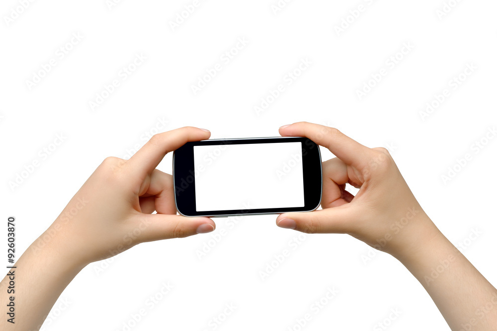 Young woman holding smartphone - isolated on white background Young woman holding smartphone - isolated on white background