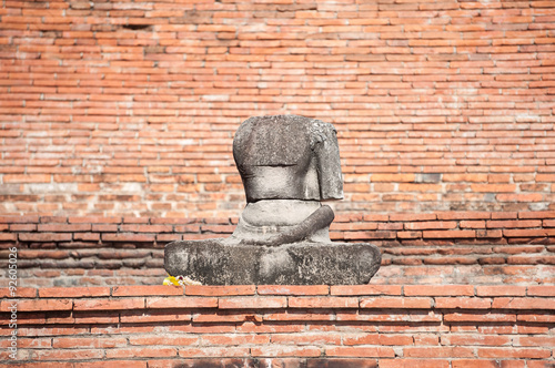 Damaged Buddha statue in the grounds of Wat Mahathat  Ayutthaya  Thailand