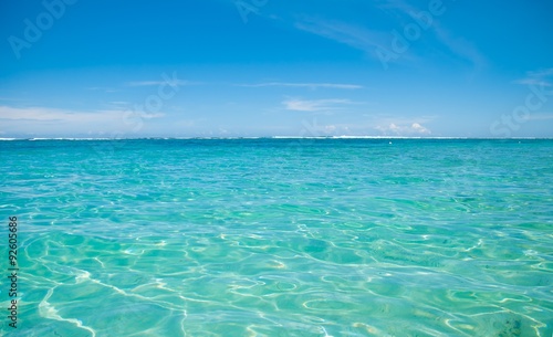 Clear sea water and blue sky