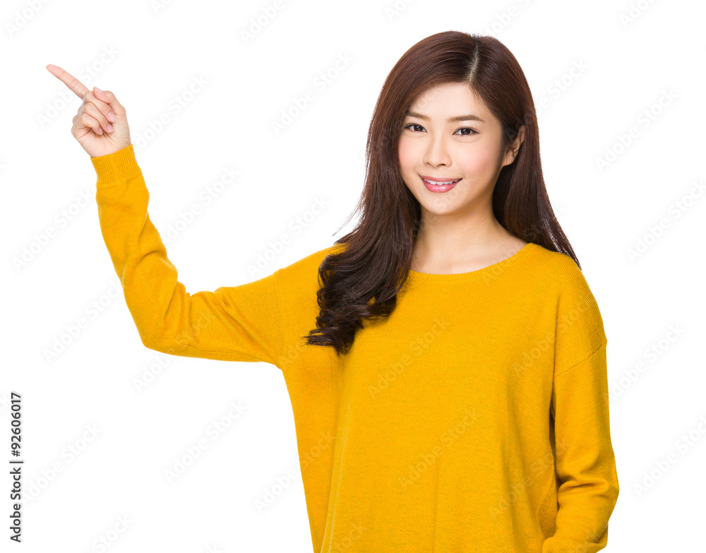 Woman with finger point aside Woman with finger point aside