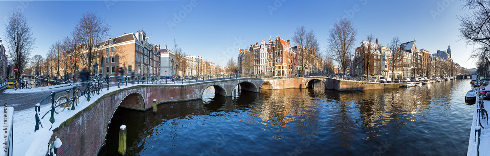 Beautiful winter panorama of the Unesco world heritage city canals of Amsterdam, The Netherlands.