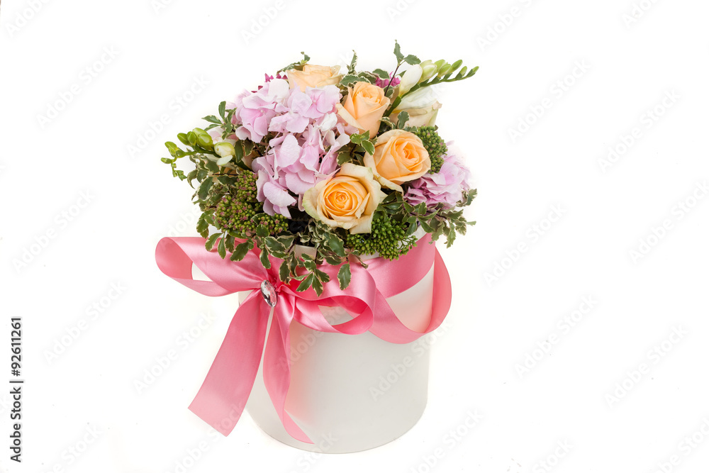 gift bucket with roses, hortensia,  freesia, and bougainvillea