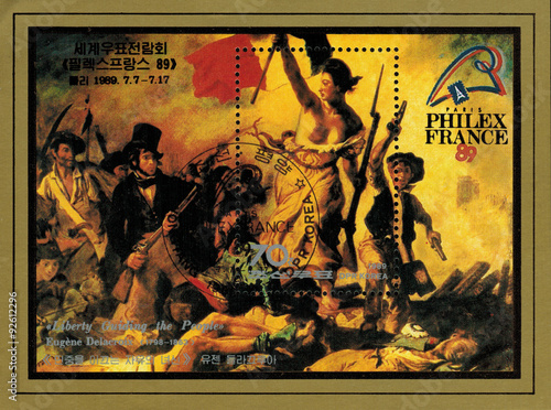 postage stamp/ mail stamp printed in DPR Korea featuring the painting of Eugene Delacroix - Liberty leading the people. The French revolution of 1830, the second French revolution, circa 1989 photo