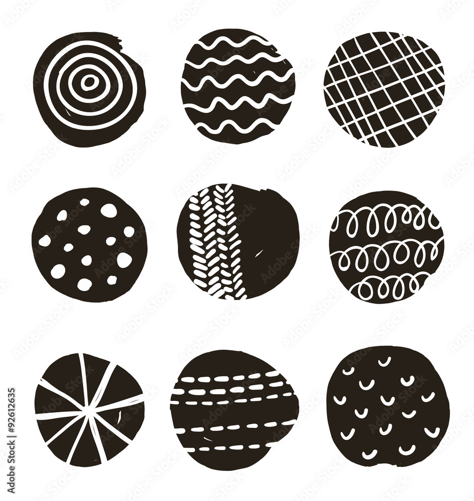 Black and white print with decorative circles.