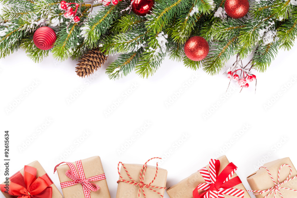 Christmas tree branch with gift boxes - obrazy, fototapety, plakaty 