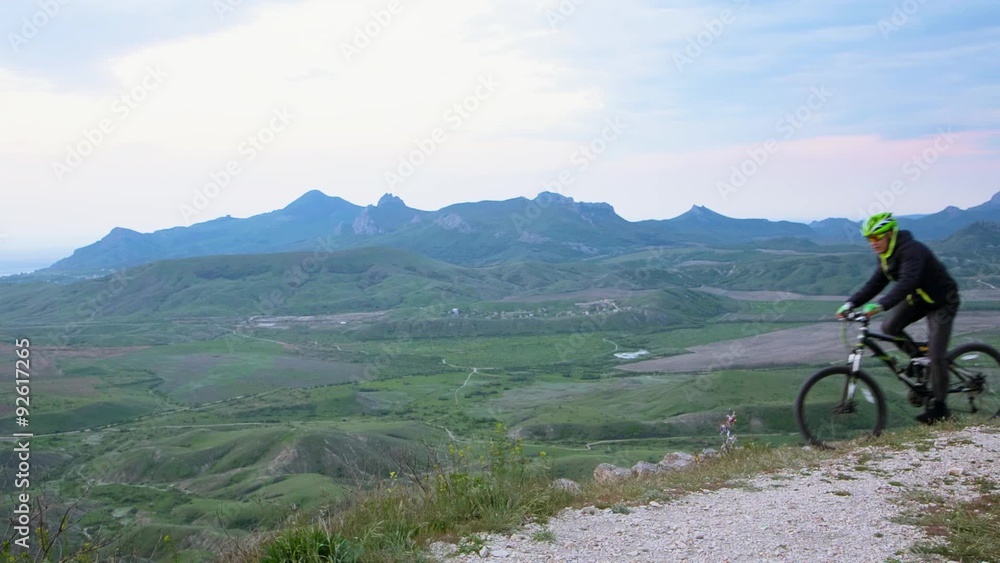 A cyclist travels across mountain Crimea A cyclist travels across mountain Crimea